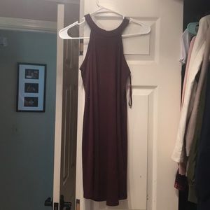 Purple dresss with high neck and no sleeves